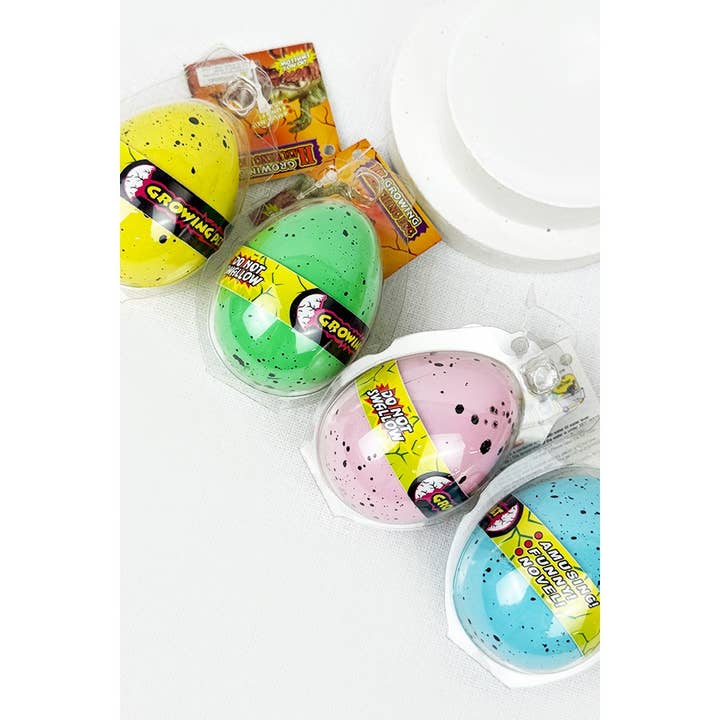 MIX COLOR Dinosaur Growing Pet Egg Toy for wholesale on Faire