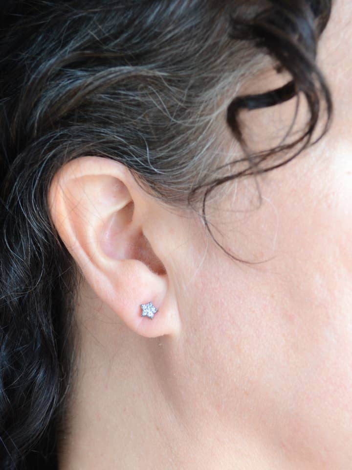 Dark rhodium plated star studs with pave cubic zirconia. for wholesale by AJS Design Studio