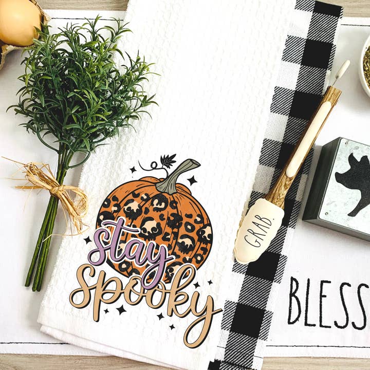 Stay Spooky Leopard Pumpkin Kitchen Tea Towel for wholesale by Henry and Hannah