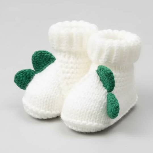 Crochet Dino Baby Booties – Soft White Newborn Shoes 🦕🤍 for wholesale by Joy Gift London