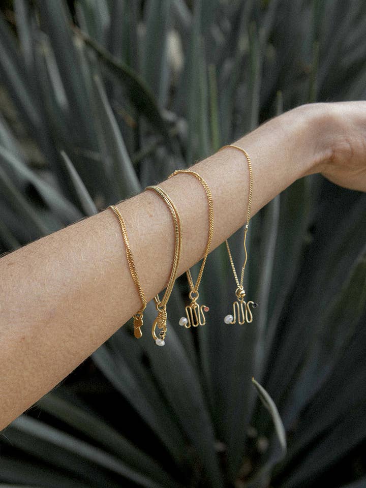 Epure dobbelt slange armbånd for engroshandel hos Judith Benita