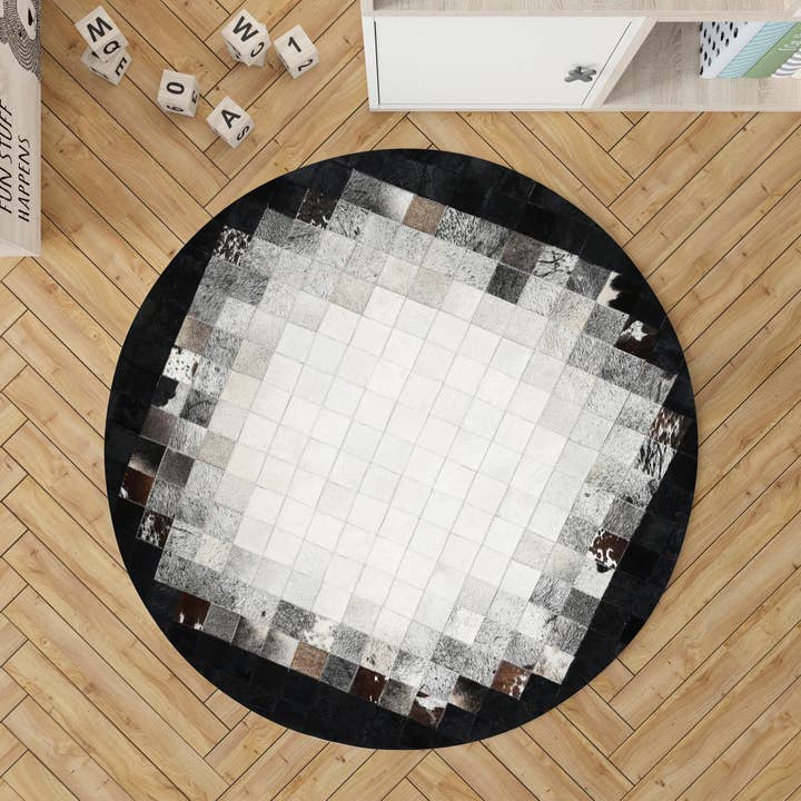 Round Cowhide Rug Black White, Handmade Leather Area Rug for wholesale by Karelias And Sons