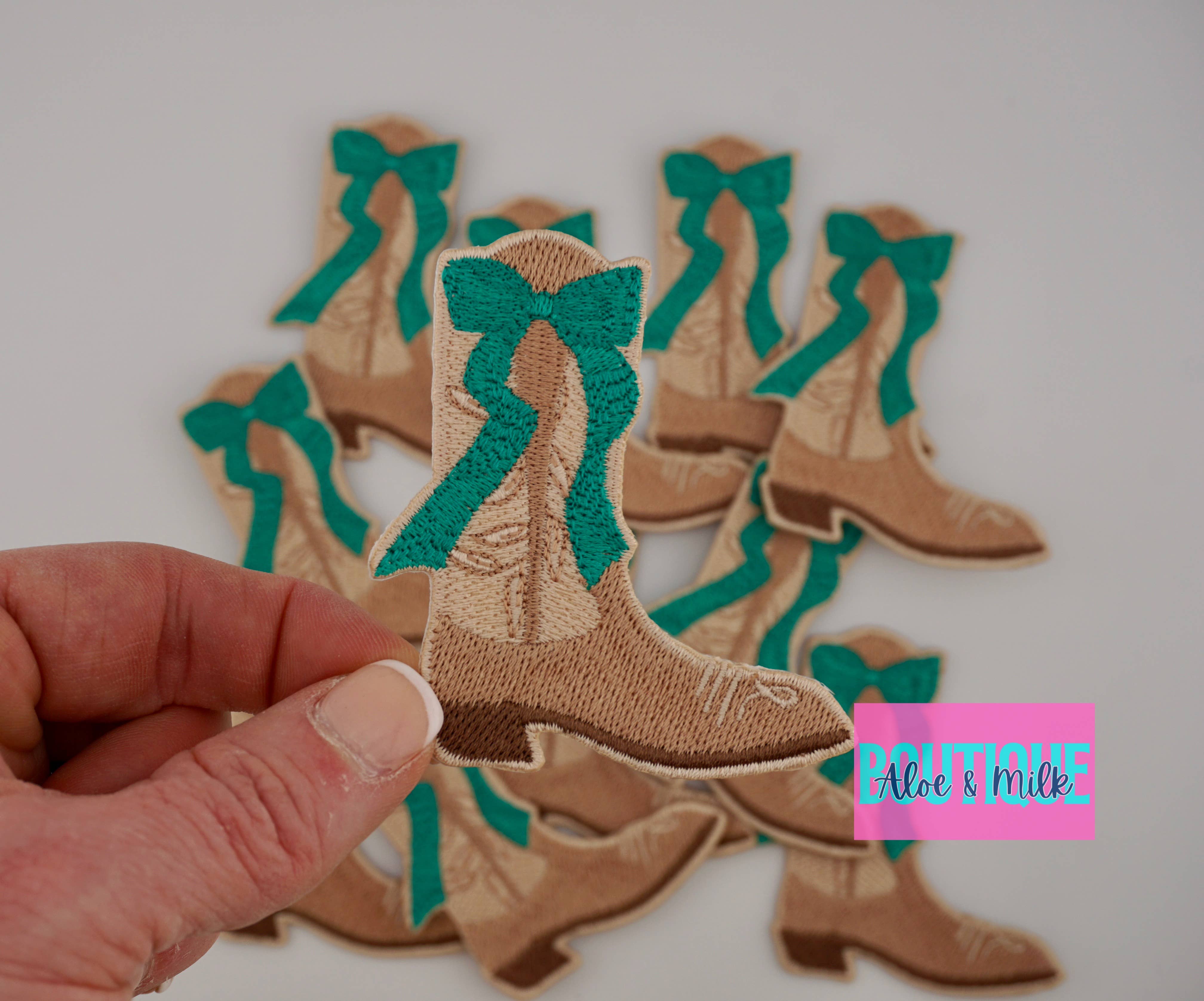 Aloe and Milk Boutique – wholesale Hat accessory – Women's – Boot with bow, western patch, cowgirl, cowboy, texas patch1