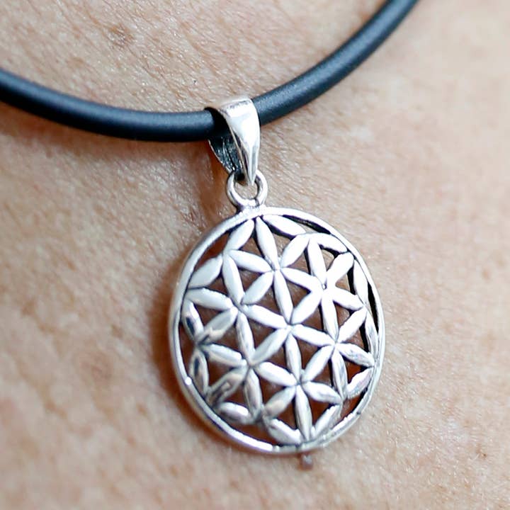 Small silver pendant with the flower of life for wholesale by Ethike.eu