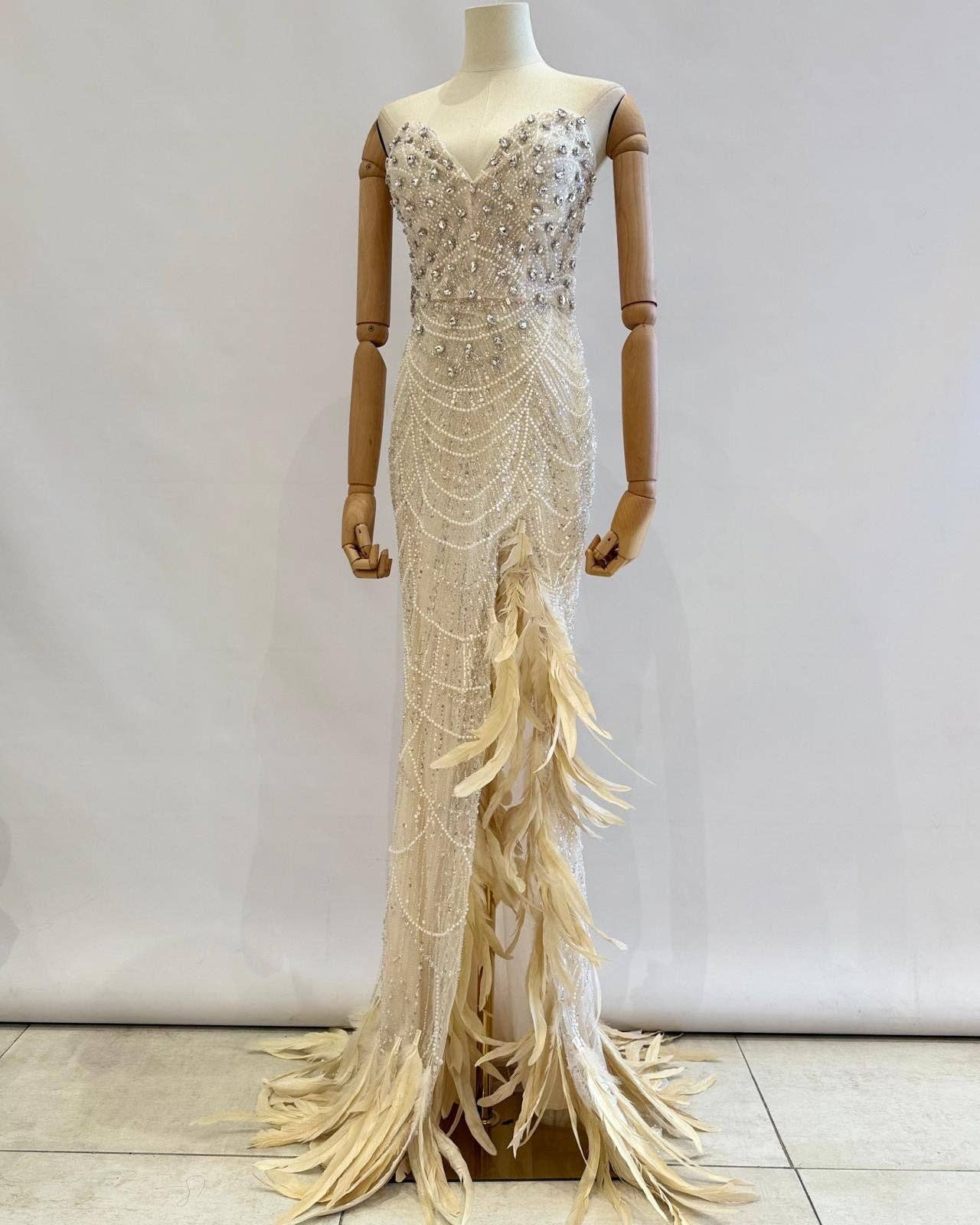 Nu Robe longue plumes TYS091 en vente sur Faire2