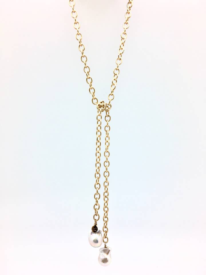 Malin, lariat doré pour la vente par In2 design