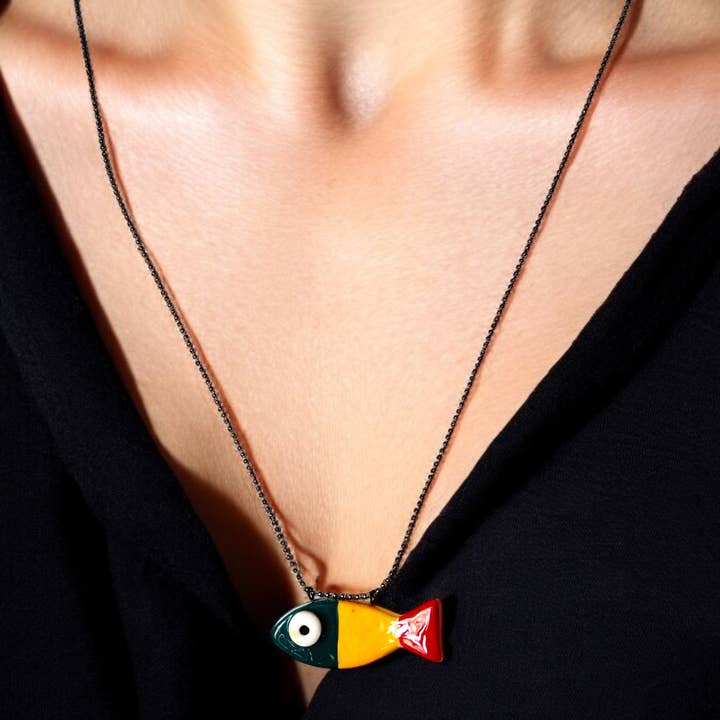 Ciondolo a forma di pesce in ceramica (con collana) and other Purchase Wholesale farina di pesce. Free Returns & Net 60 Terms on Faire trending on Faire.