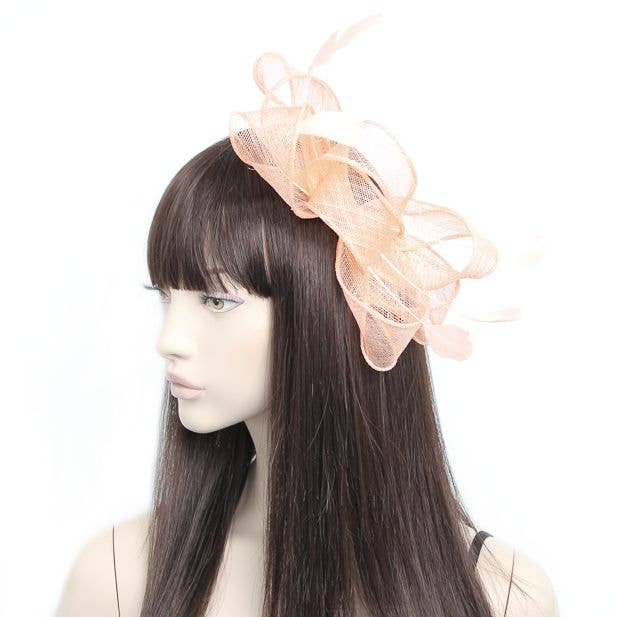 Style Camille. Nude Fascinator On A Comb for wholesale by Inca UK