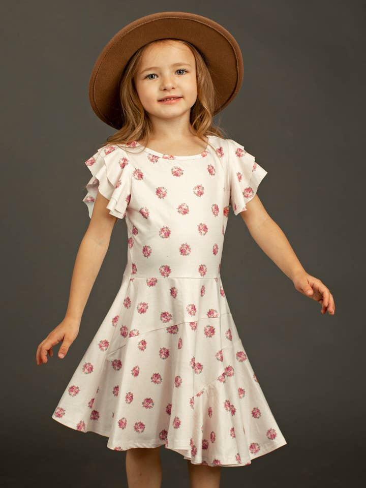 Marci-jurk in bloemenstip crème voor wholesale door Joyfolie