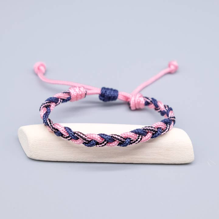 Bracciale in paracord intrecciato rosa e blu marino per la vendita all'ingrosso da parte di La Fabrique du Noeud