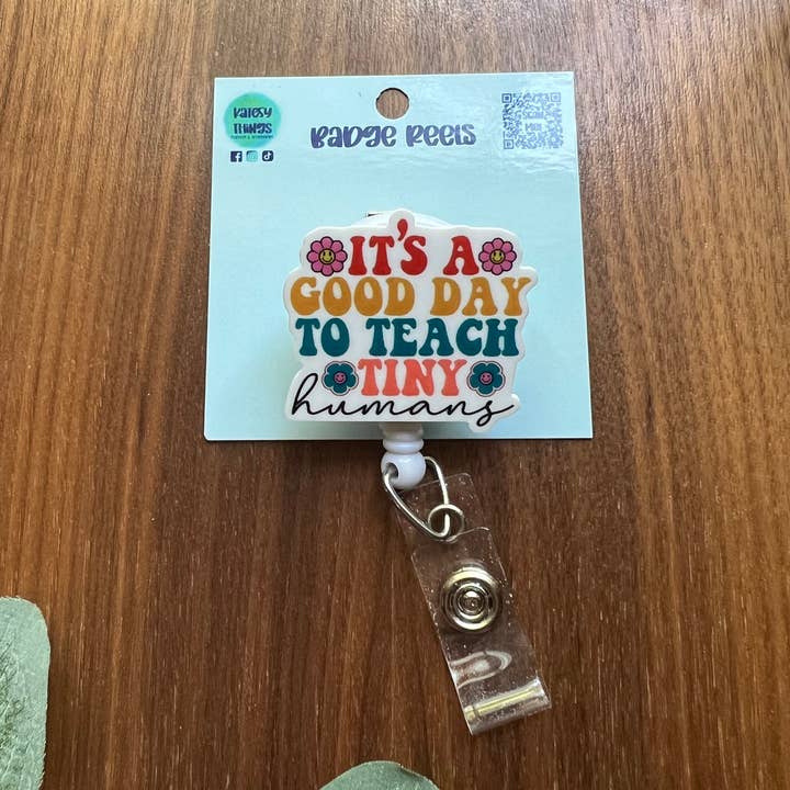 It’s A Good Day To Teach Tiny Humans - Groovy Badge Reel for wholesale by Katesy Things