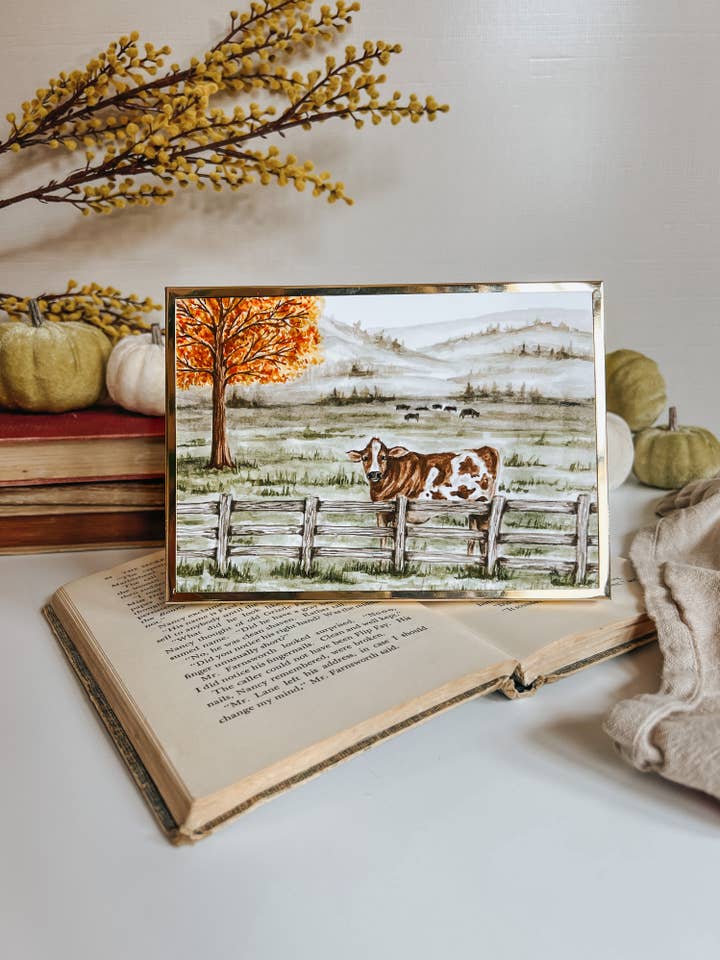 Cow in a Field Watercolor Art Print for wholesale by MacaelaMade
