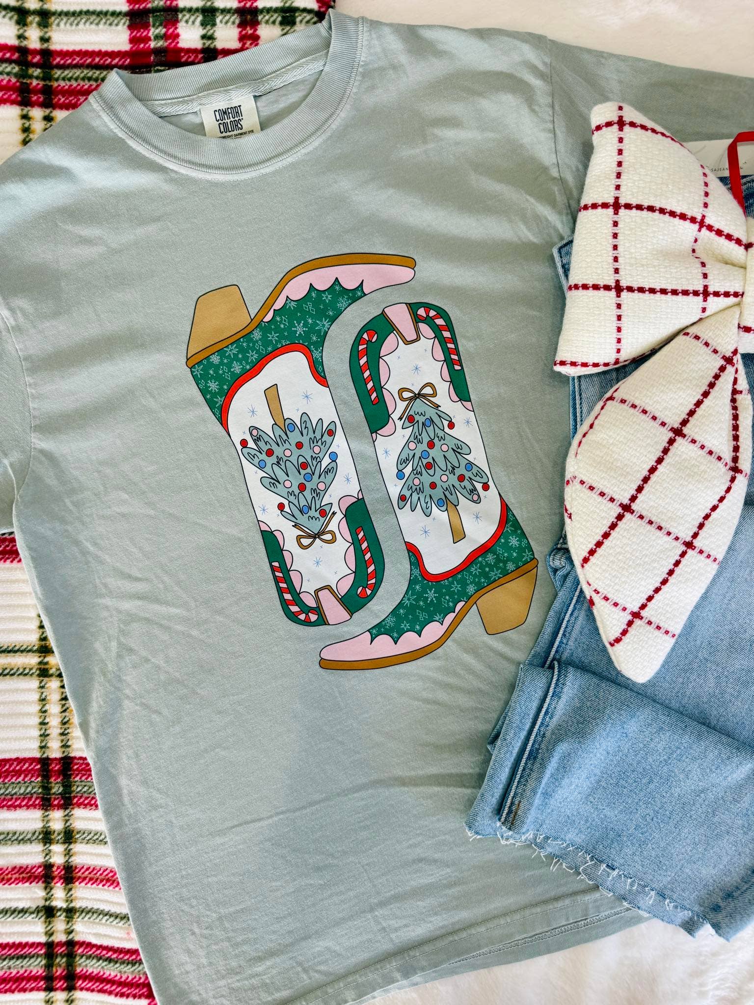 Bay Cowgirl Christmas Boots DTF Graphic Tee for wholesale on Faire1