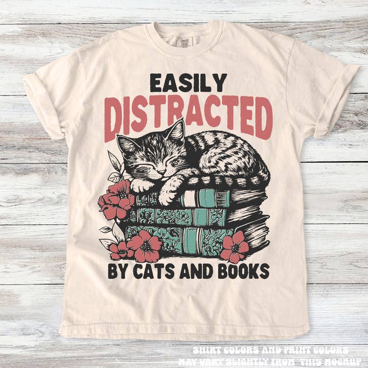 Easily Distracted By Books And Cats Shirt - Printed On Comfort Colors for wholesale by Madi Moosh