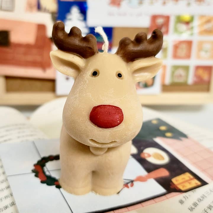 Reindeer Candle for wholesale by Big Fan Art Studio Inc.