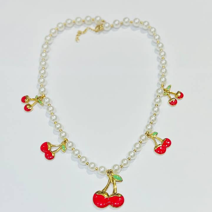 Stainless steel necklace with mother-of-pearl beads and cherry pendants for wholesale by Bijoux 7bis