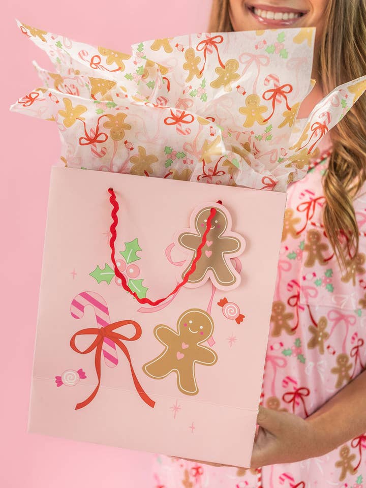 Pink Christmas Gingerbread Bows Gift Bag with Tag - 3 sizes for wholesale by Rock Paper Scissors