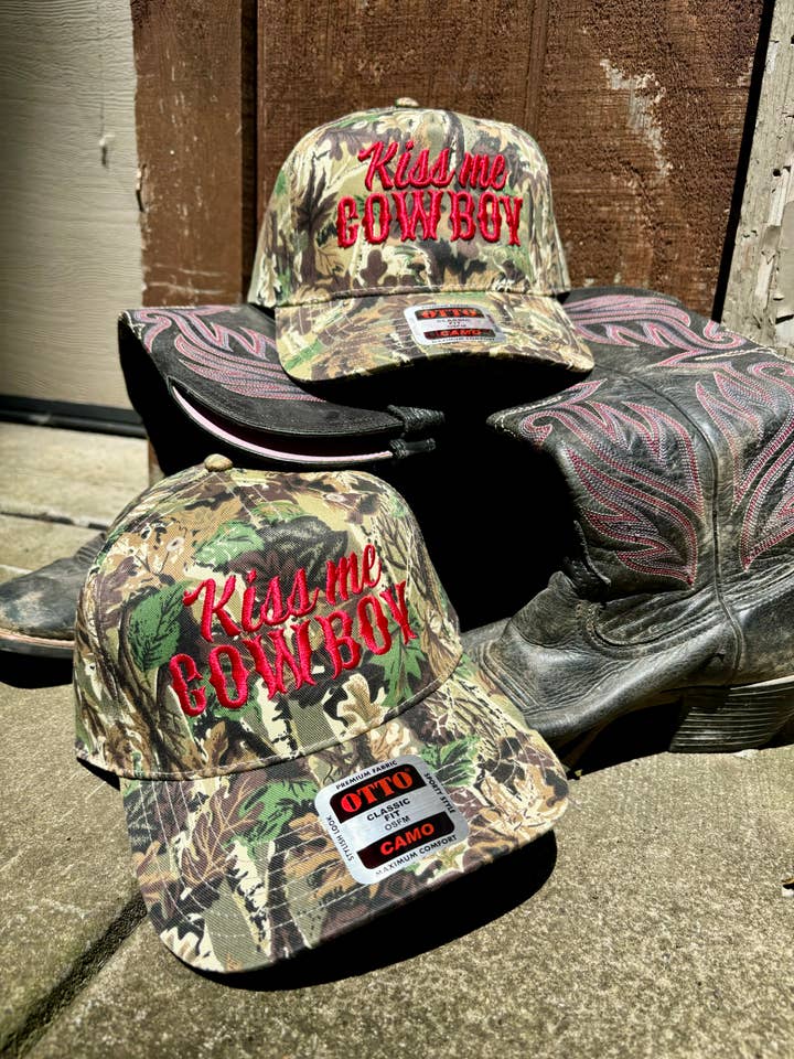 Kiss Me Cowboy Camo Trucker Hat for wholesale by The Vaulty