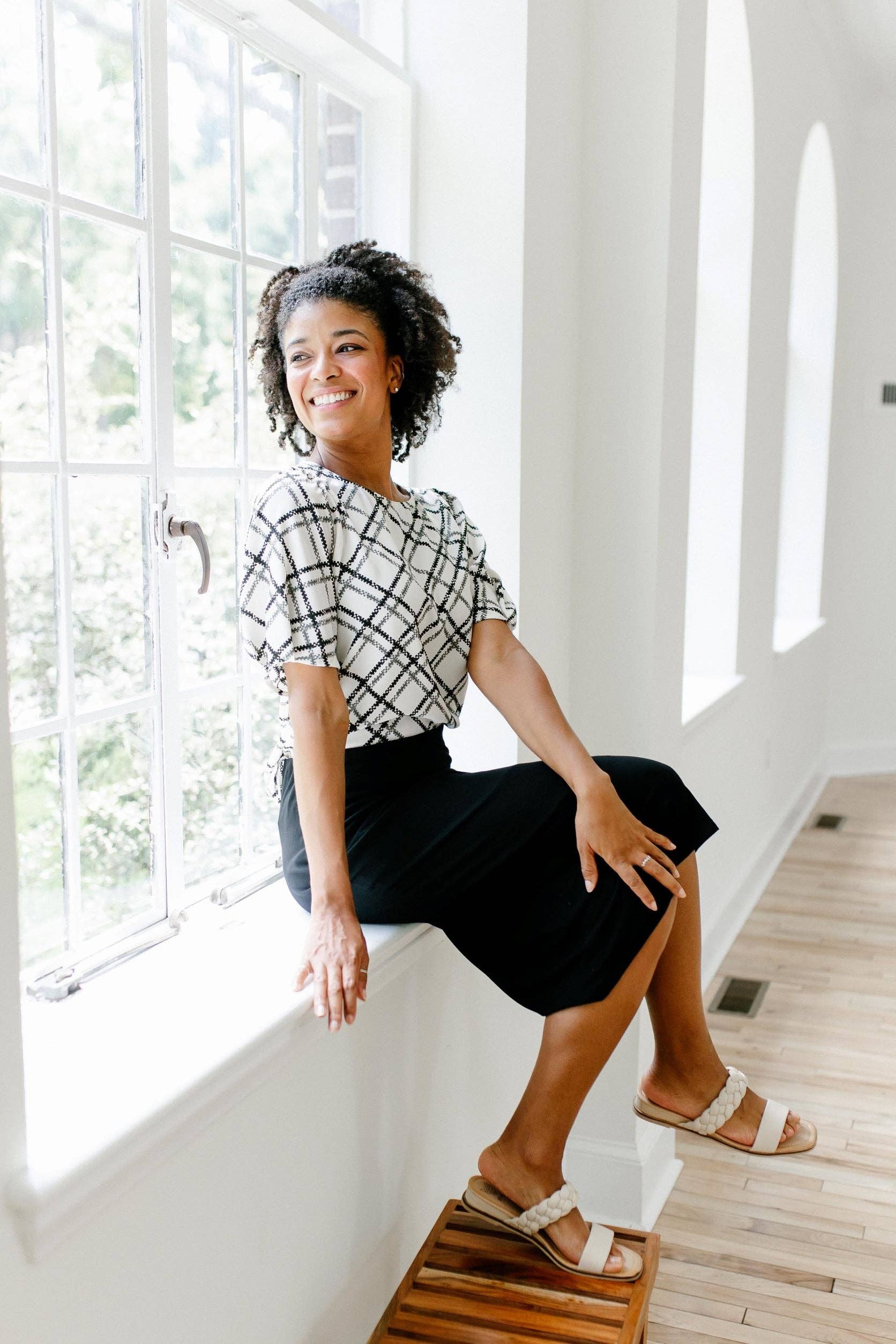 Black 'Sasha' Knit Midi Skirt for wholesale on Faire12