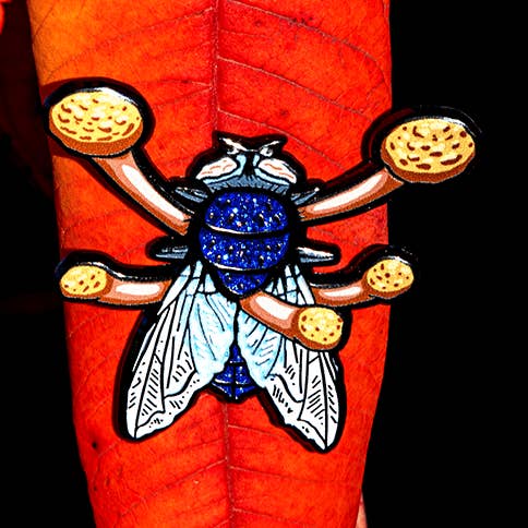Cordyceps Zombie Fly Enamel Pin for wholesale by The Roving House