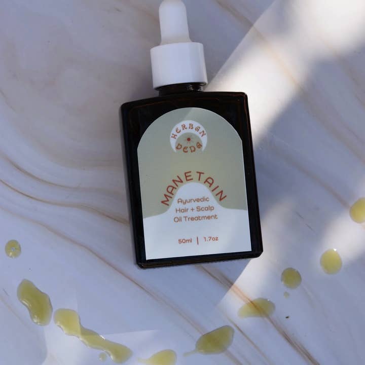Manetain óleo ayurvédico para crescimento capilar por atacado de Herban Veda
