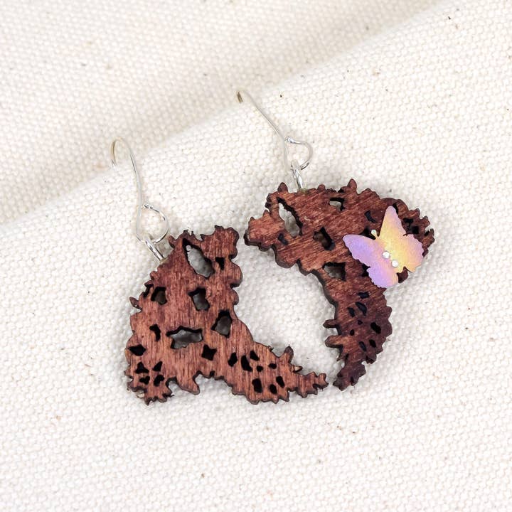 Boucles d'oreilles en forme de papillon entièrement phosphorescentes pour la vente par Radiance & Romance