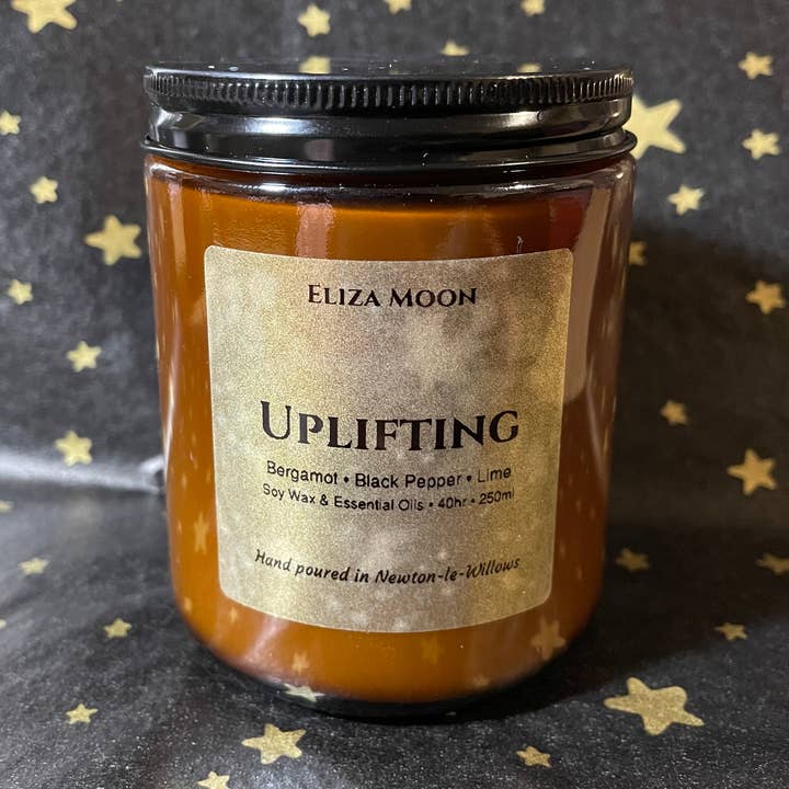 Vela de Aceite Esencial Revitalizante en Tarros de Ámbar para venta al por mayor de Eliza Moon