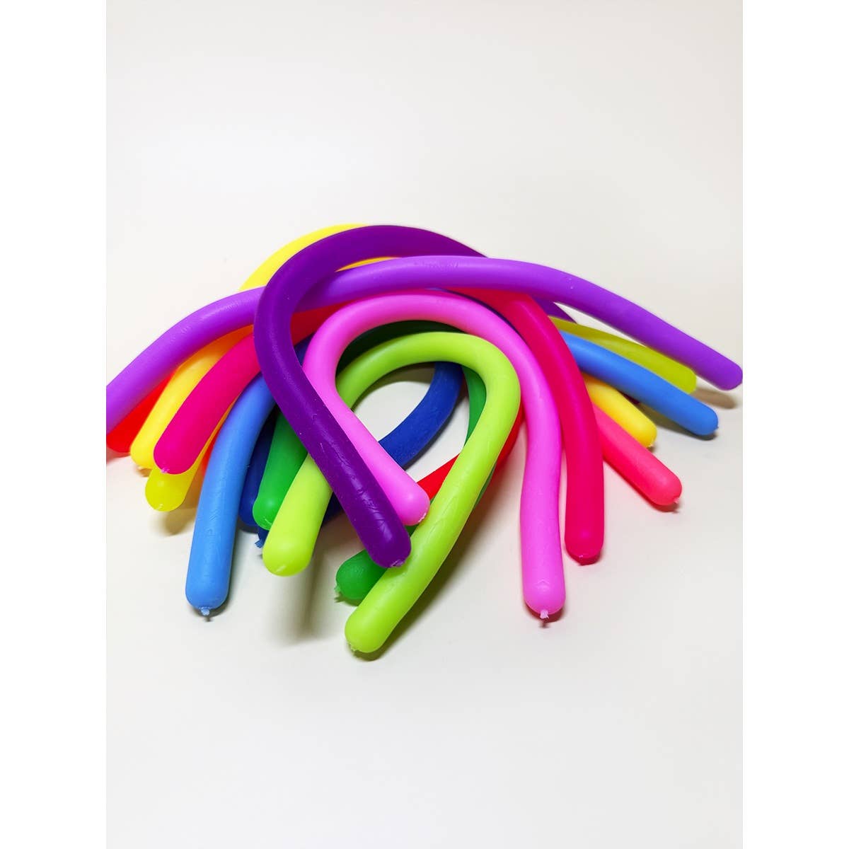 Assorted Color Large Monkey Noodle Stress Relief Fidget Toy for wholesale on Faire