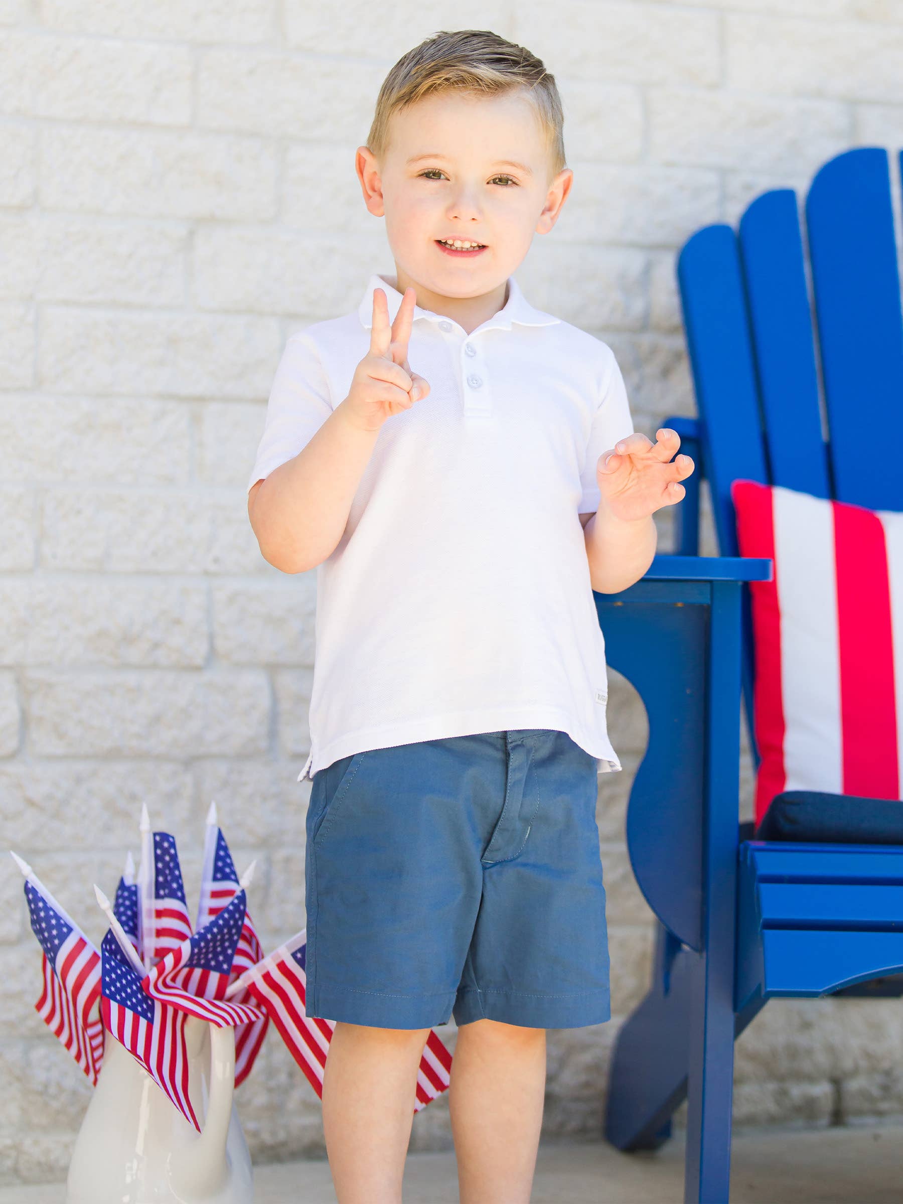 Boys White Pique Short Sleeve Polo Shirt for wholesale on Faire5