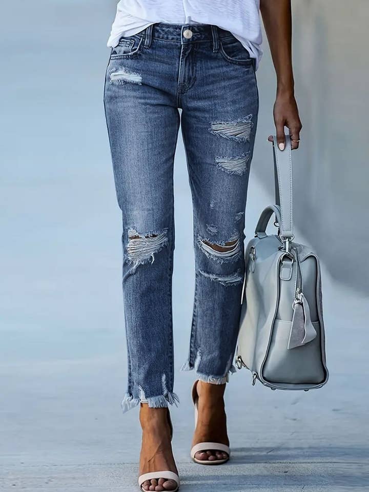 Medium Distressed Raw Hem Jeans with Pockets for wholesale on Faire