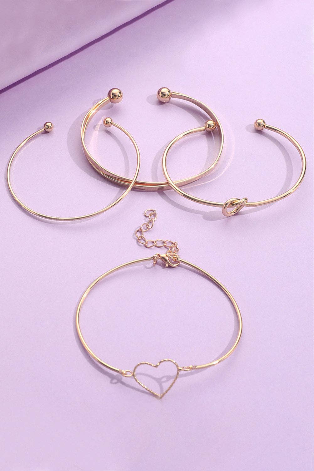 Gold Love Geometric Cross Bracelet 4-piece Set for wholesale on Faire1