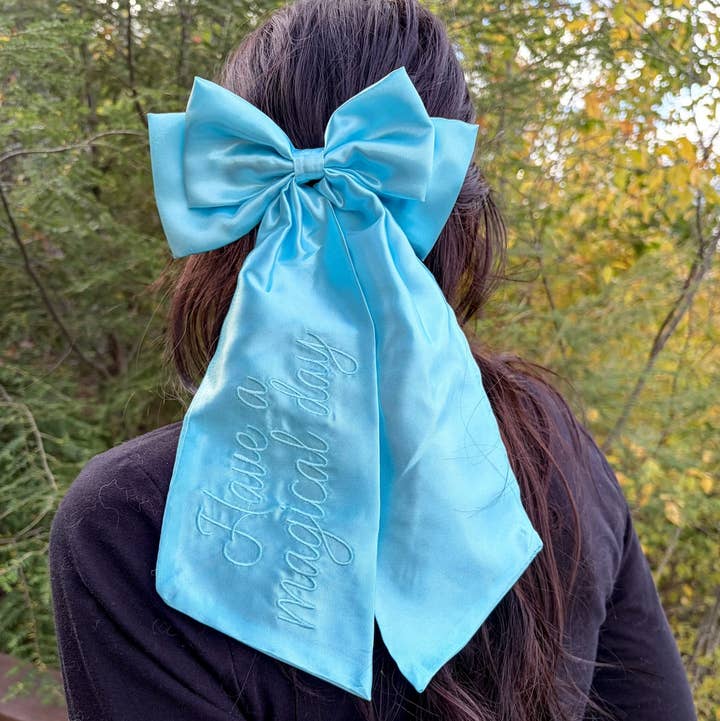 Magical Day Satin Hair Bow Clip | Embroidered Accessory for wholesale by Blissfully Bookish Company