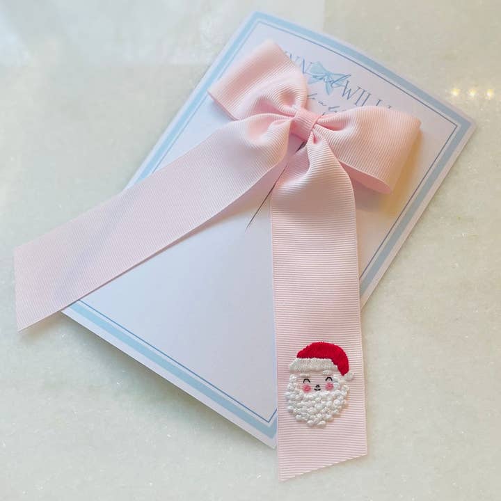 Pale Pink Santa Claus Bow for wholesale on Faire1