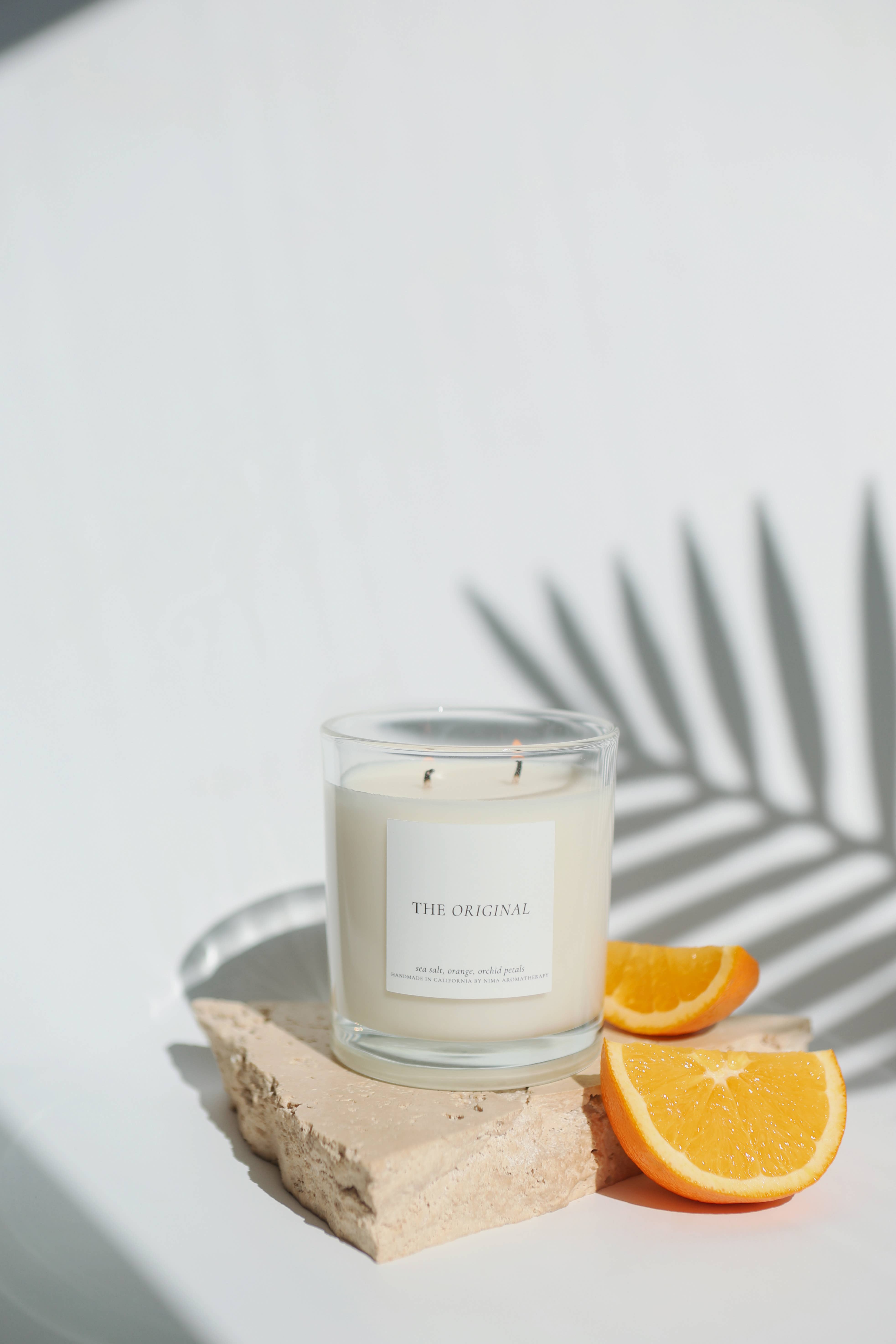 NIMA aromatherapy - Wholesale Jar/Filled Candle - Sea Salt + Orange + Amber - 12 oz clear jar soy wax candle