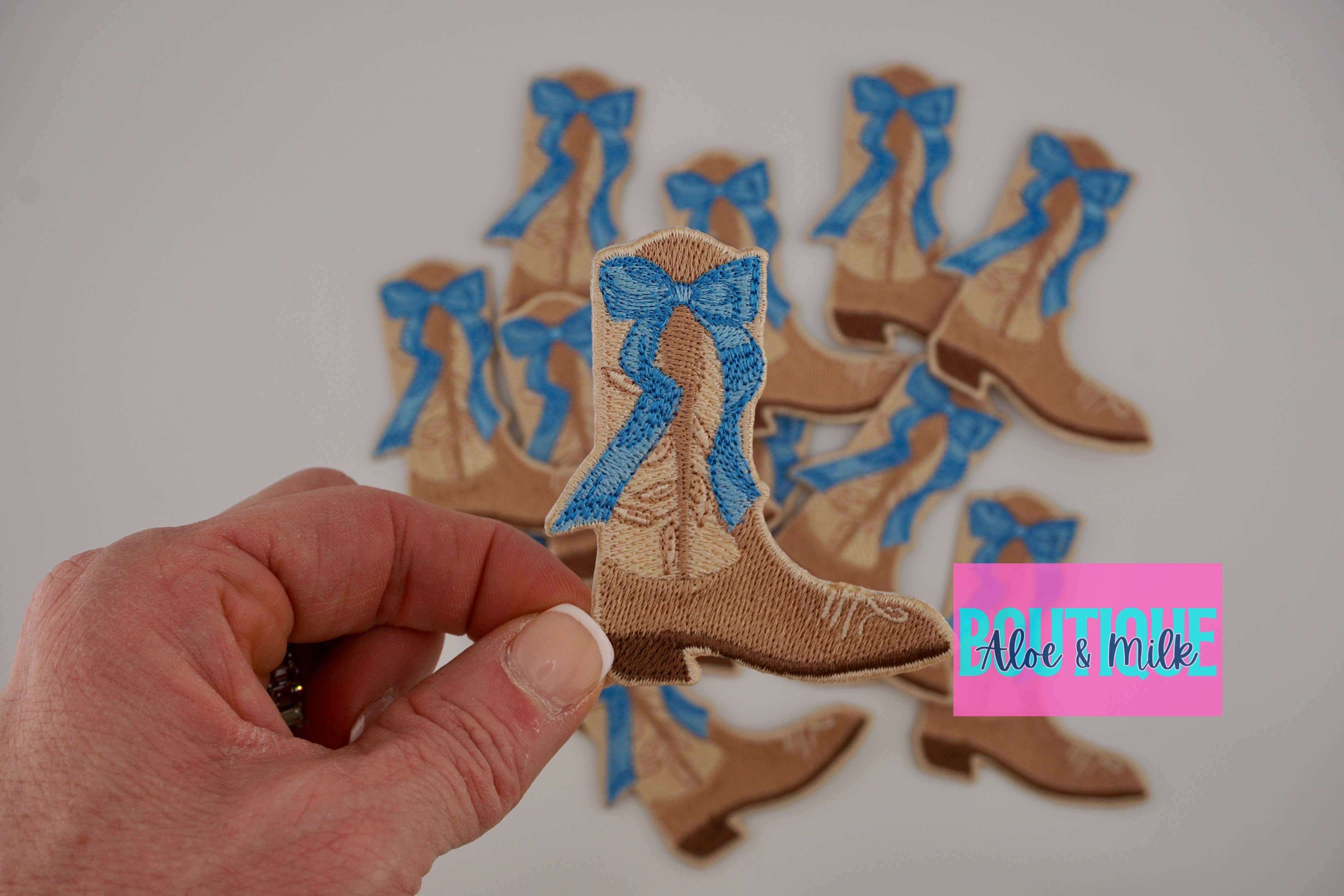 Aloe and Milk Boutique – wholesale Hat accessory – Women's – Boot with bow, western patch, cowgirl, cowboy, texas patch19