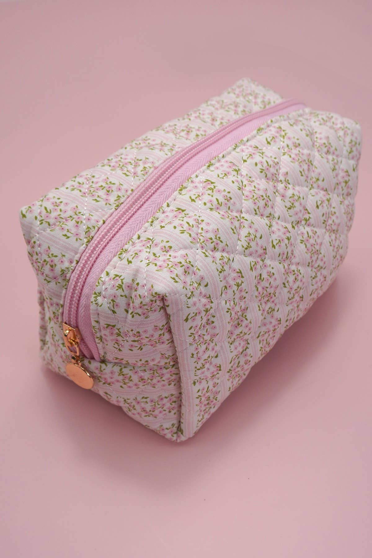 Pink FLORAL QUILTED COTTON DITSY COSMETIC POUCH BAG | 40P555 for wholesale on Faire