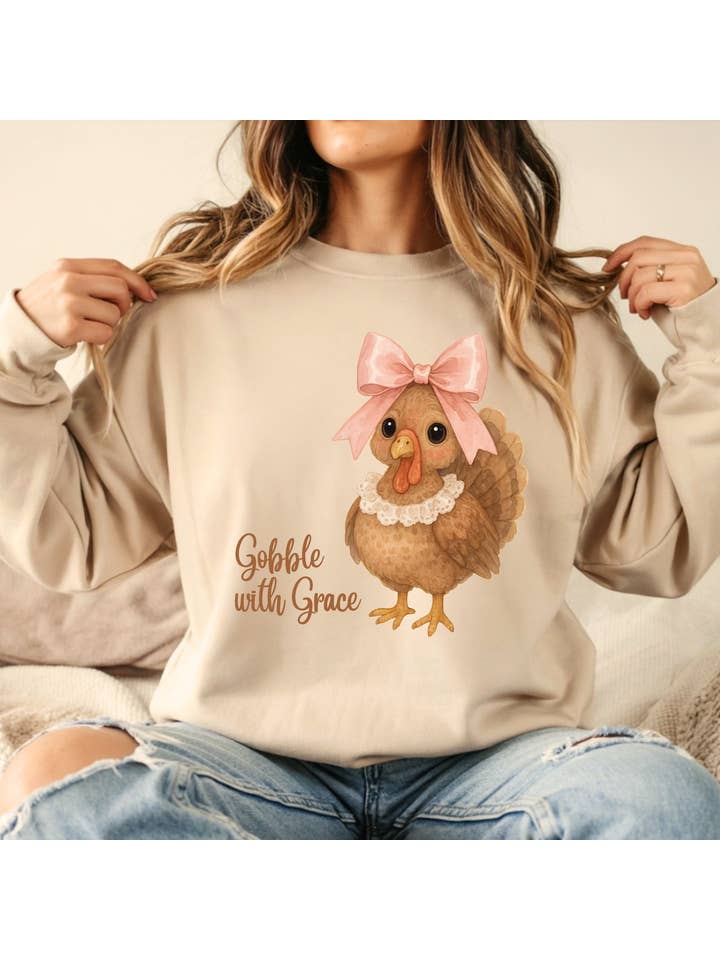 Sand Coquette Thanksgiving Turkey Crewneck with Pink Bow & Lace for wholesale on Faire