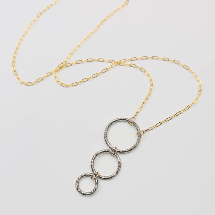 Long Triple Circle Bass String Necklace for wholesale by Middle Sister Designs