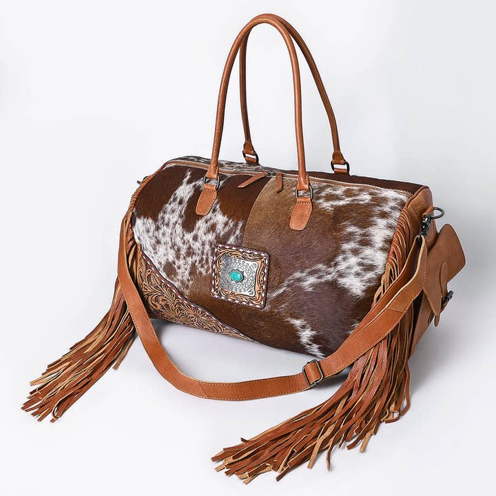 LS Western - Wholesale Weekender bag – women's - ADBG608 Hair-On-Hide Cowhide Duffle Bag with Tooled Leather & Fringe Western Weekender with Turquoise Concho