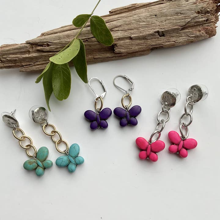 Turkosa fjärilsdesignerörhängen (dinglande, långa) för wholesale av J. Jansen Designs