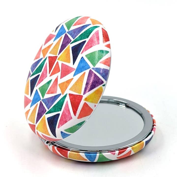 Tilfældige malede farvede trekanter cirkulært kompakt spejl for engroshandel hos Tempest Designs