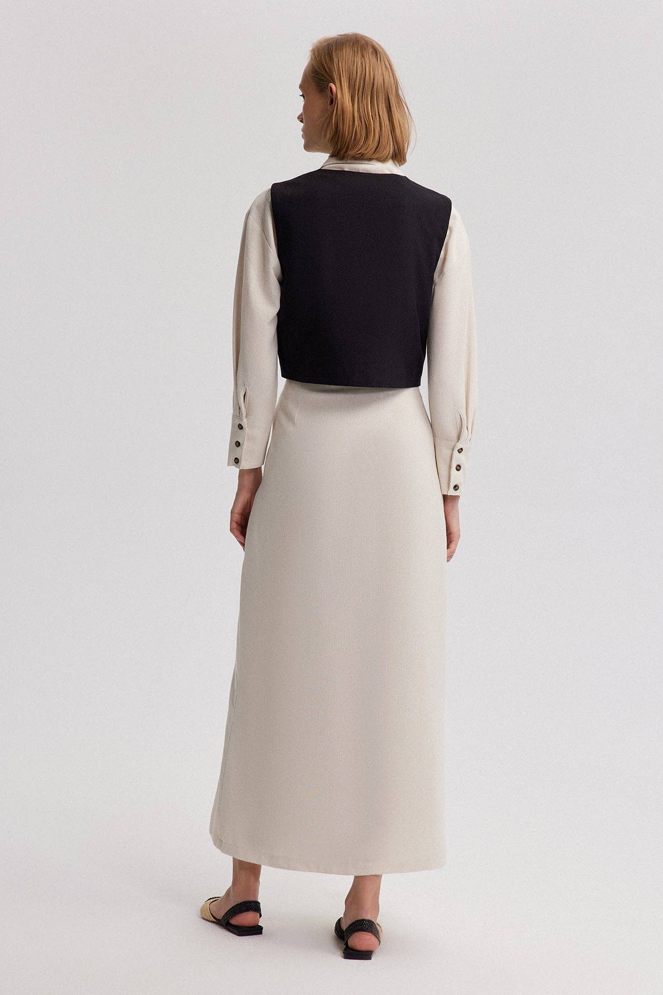 Black EMBROIDERED LINEN VEST for wholesale on Faire2