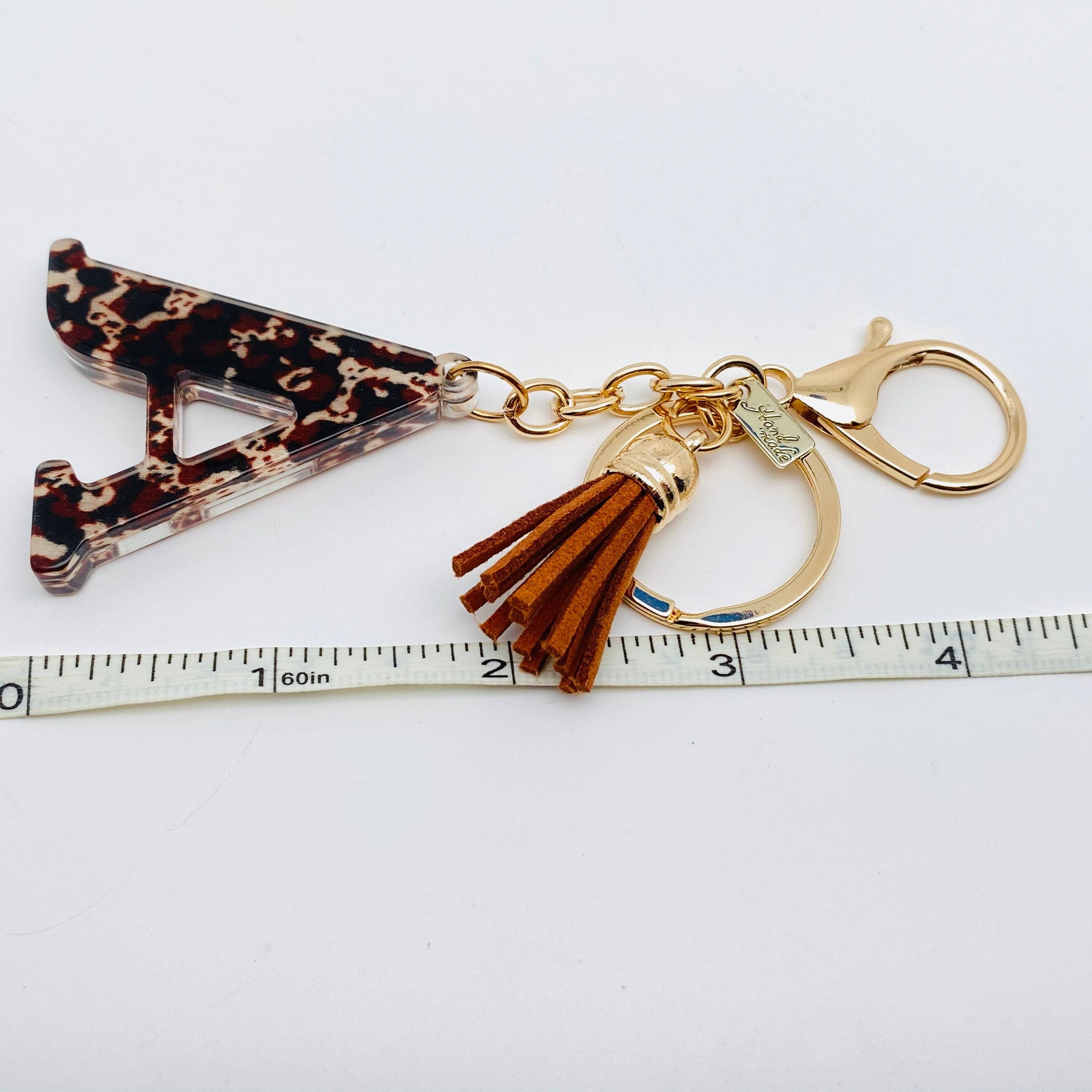 Mio Queena - Wholesale Keychain - Women's - Fashion Leopard Print 26 Letters Keychain Bag Pendant1