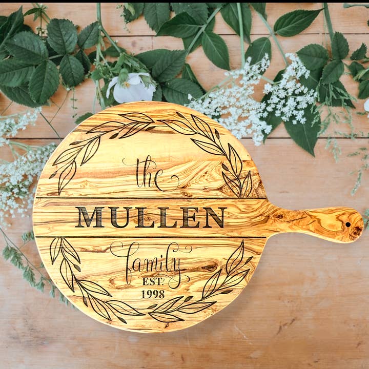 Round 12" Olive Wood Cutting Board for wholesale by Black River Arts