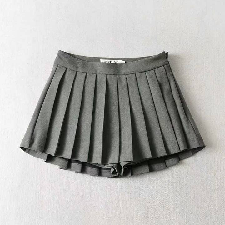 Dammodet Elegant Enfärgad Plisserad Högmidjad Kjol för wholesale av SALINA TRADING INC