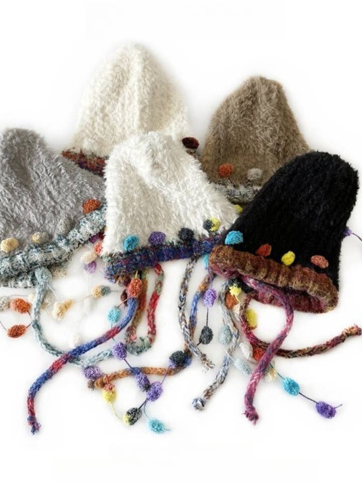 Haila - Winter Knitted Beanie with Pompom & Tassel Braids for wholesale by Funkyrel® Atzbranding Limited