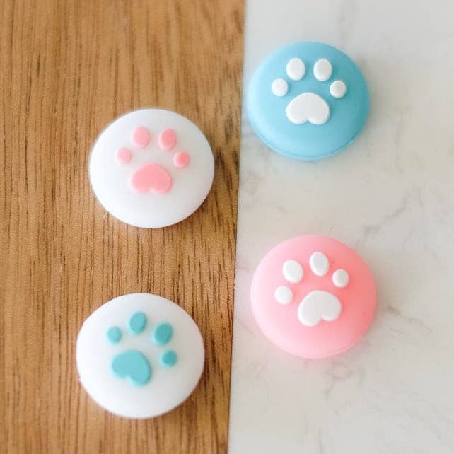 Pink & Blue Paw Thumb Grips (2 Sizes Available) for wholesale by StickieTech