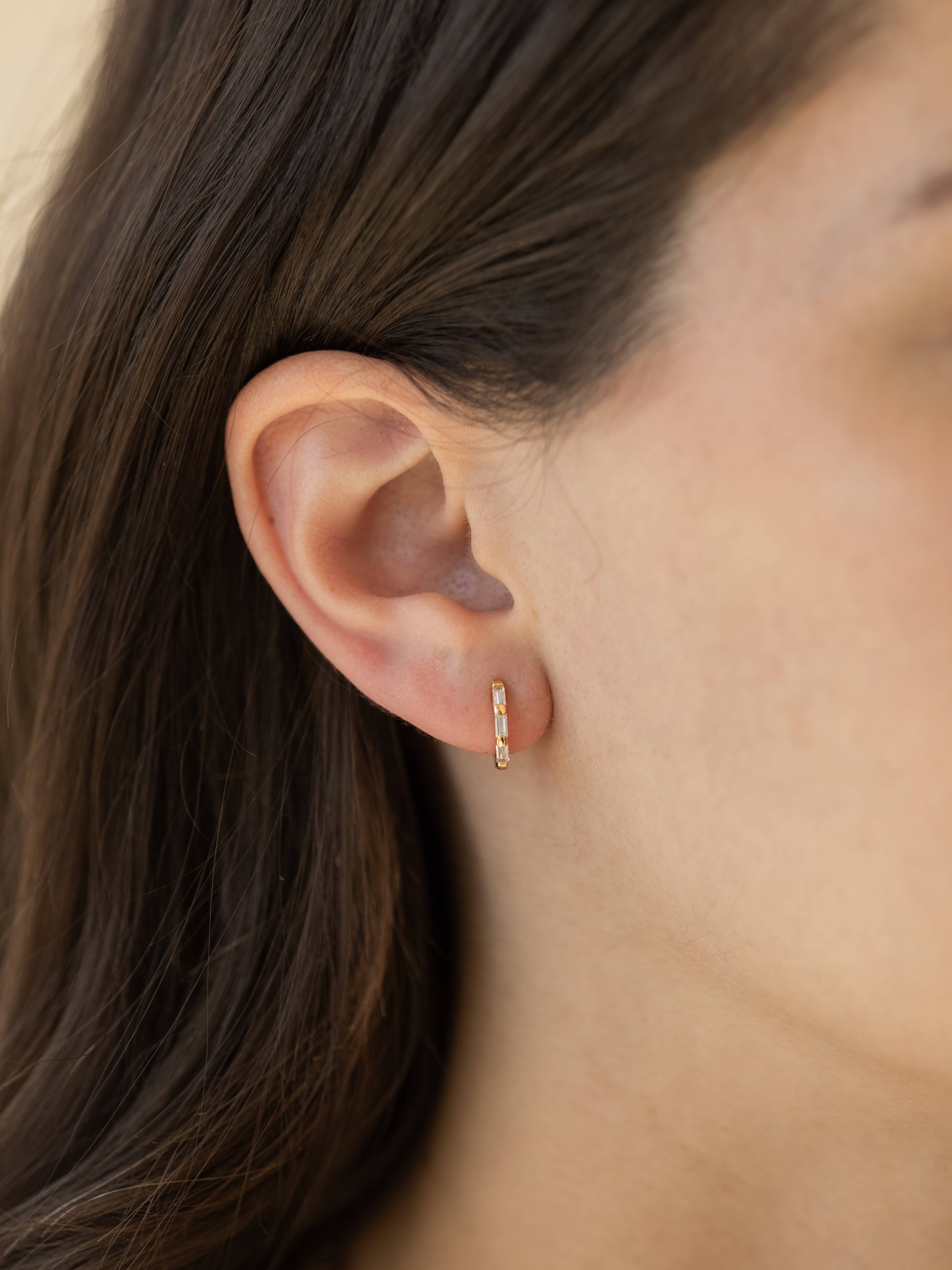 The Land of Salt - Wholesale Huggie Earrings - Clear CZ Baguette Huggie Hoops in Gold - Earrings5
