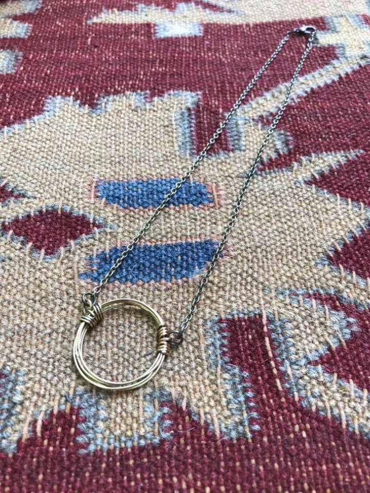 Modern Infinity Necklace for wholesale by Commonality Cooperative