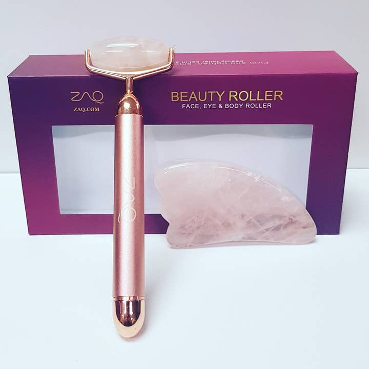 ROLL-ON ROSE QUARTZ W-SONIC VIBRATING FACE ROLLER + GUS SHA for wholesale by ZAQ Skin + Body Care